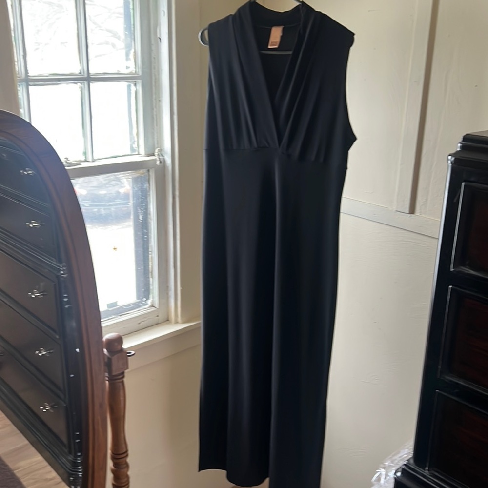 Long elegant legs size large sleeveless black dress soft and stretchy